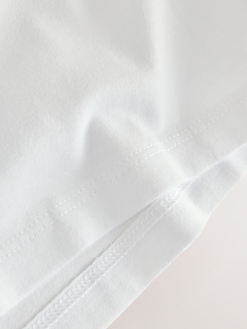T-Shirt Next en blanc