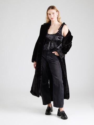 Monki - Blusa en negro