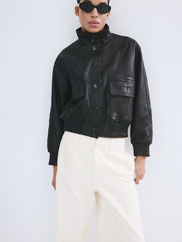 Wide leg Pantaloni con piega frontale 'Alma' di MANGO in bianco