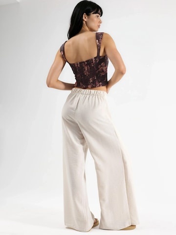 Wide leg Pantaloni di Busem in beige