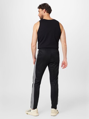 regular Pantaloni 'Beckenbauer' di ADIDAS ORIGINALS in nero