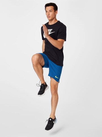 NIKE Regular Sportshorts in Blau