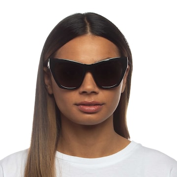 LE SPECS Sunglasses in Black: front