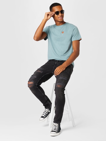 ABOUT YOU Regular Jeans 'Erwin' in Zwart