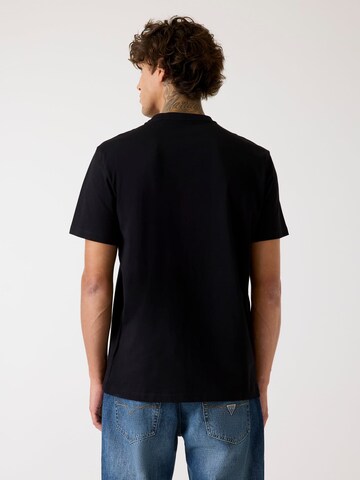 GUESS T-Shirt in Schwarz