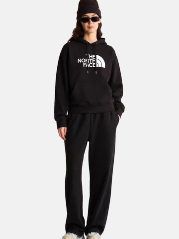 THE NORTH FACE Bluzka sportowa 'THE NORTH FACE W ESS DP REG HOODIE Maglieria' w kolorze czarny