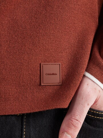 Calvin Klein Pulover | rdeča barva