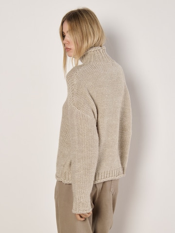 Pull-over ' ' Apricot en gris
