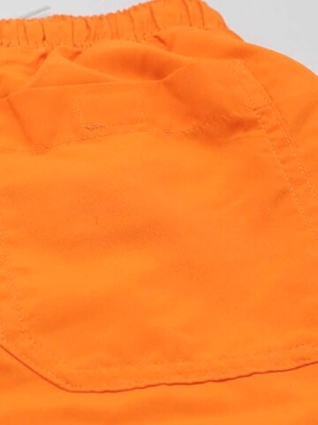 Surf Monkey - Bermudas en naranja