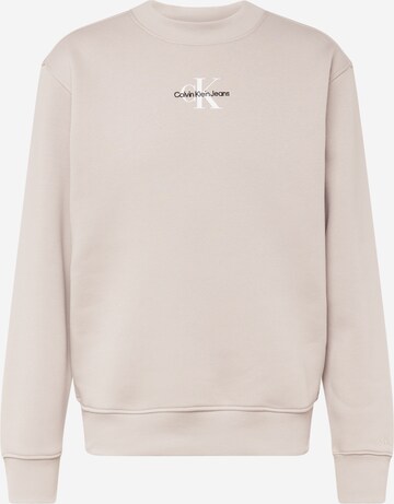 Sweat-shirt Calvin Klein Jeans en beige : devant