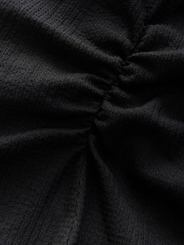 Robe Next en noir