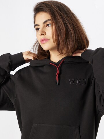 PUMA Sweatshirt 'x Vogue Collection' in Black