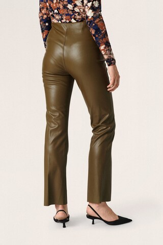 SOAKED IN LUXURY Regular Trousers with creases 'Kaylee' in Brown