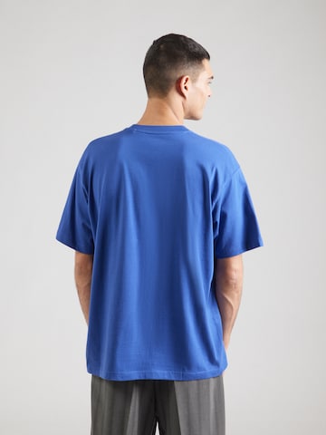 GUESS JEANS Bluser & t-shirts i blå