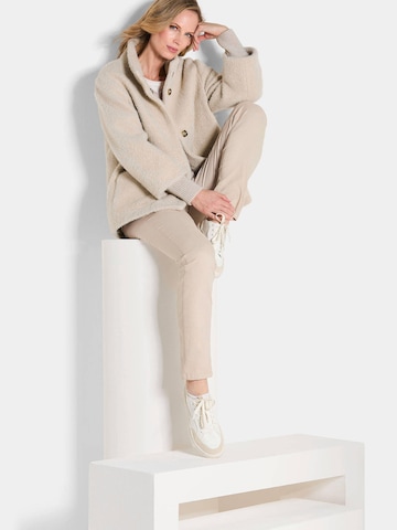 Goldner Tussenjas in Beige