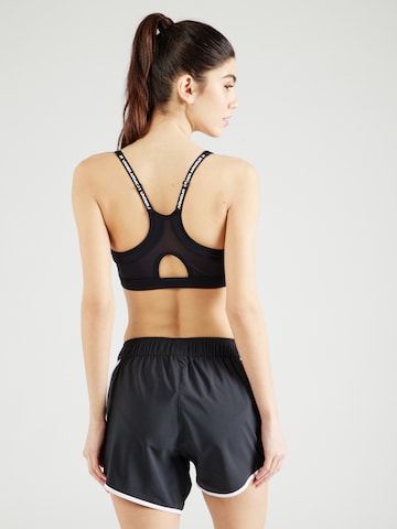 UNDER ARMOUR Bustier Urheilurintaliivit 'Infinity' värissä musta