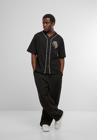 Karl Kani Comfort fit Koszula 'Legacy' w kolorze czarny