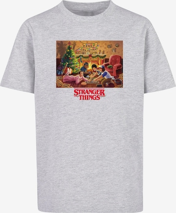 ABSOLUTE CULT T-Shirt 'Stranger Things - Christmas Gathering' in Grau: Vorderseite