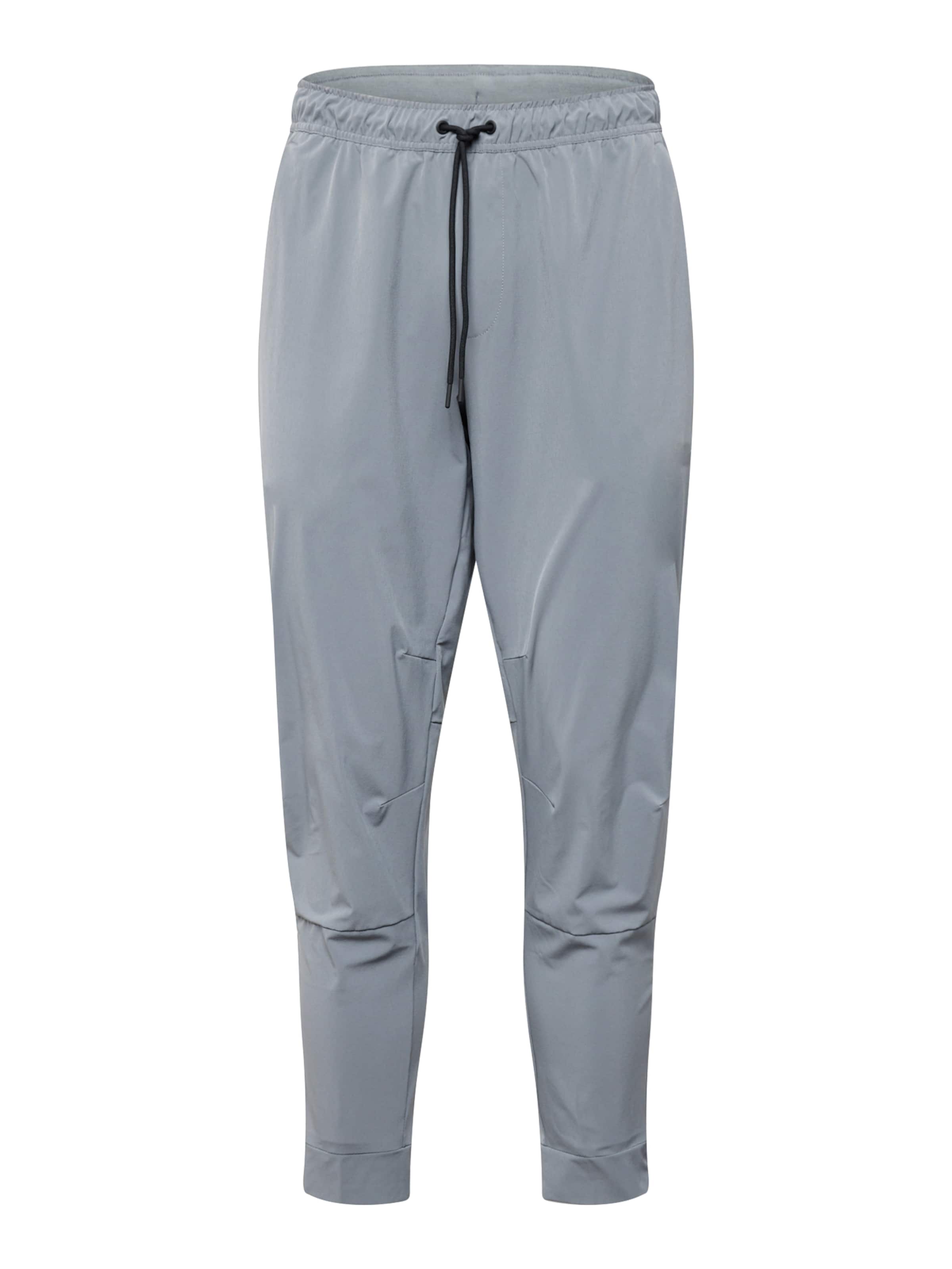 NIKE Спортивные штаны 'UNLIMITED' в Серый: спереди