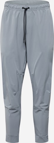 NIKE Sports trousers 'UNLIMITED' in Grey: front