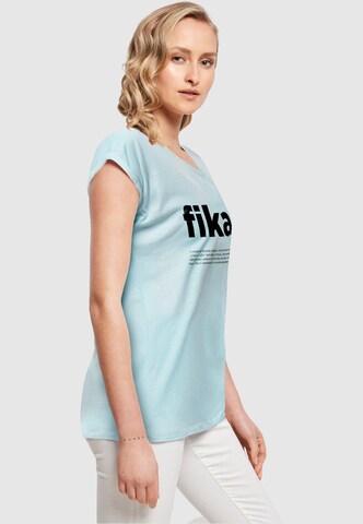 T-shirt 'Fika Definition' Mister Tee en bleu