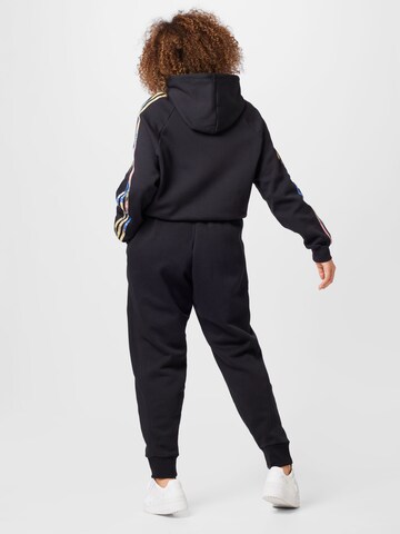 Effilé Pantalon de sport 'All Szn Fleece ' ADIDAS SPORTSWEAR en noir