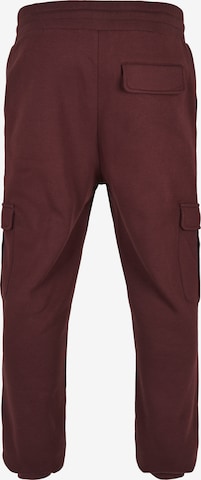 Effilé Pantalon cargo Urban Classics en rouge