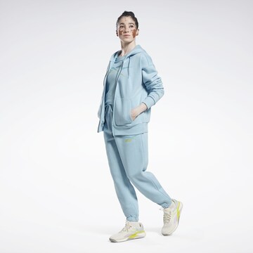 Reebok - Casaco de treino em moletão 'Doorbuster' em azul