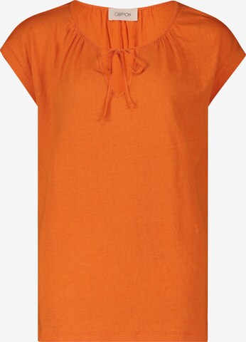 Cartoon T-shirt i orange: framsida