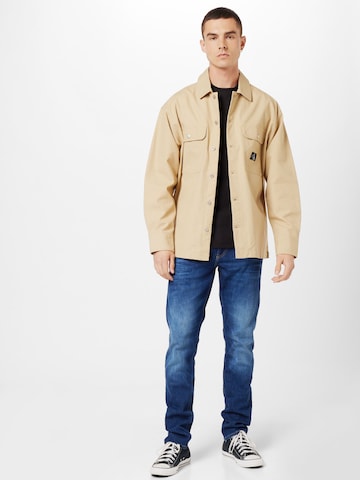 Calvin Klein Jeans Prehodna jakna | bež barva