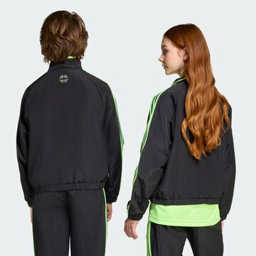 ADIDAS ORIGINALS Between-season jacket 'Teamgeist' in Black