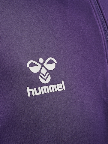Hummel Urheilullinen collegepaita värissä lila