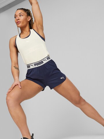 Regular Pantalon de sport PUMA en bleu : devant