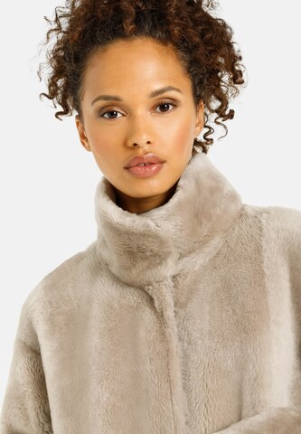Werner Christ Between-seasons coat in Beige