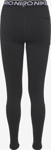 NIKE Skinny Športne hlače 'Pro Warm' | črna barva