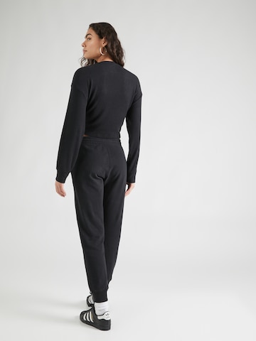 HOLLISTER Zúžený Kalhoty – černá