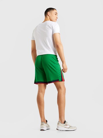 NIKE Regularen Športne hlače | zelena barva