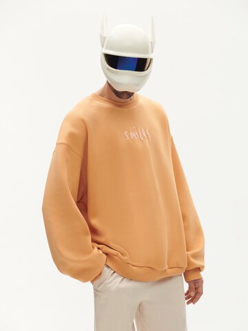 Smiles Sweatshirt 'Milo' in Orange: Vorderseite
