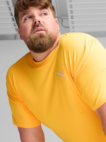 PUMA Functioneel shirt 'CLOUDSPUN' in Oranje