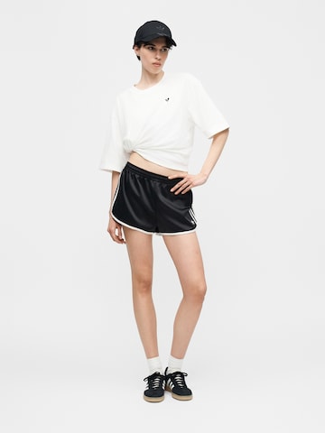 ADIDAS ORIGINALS Normalny krój Spodnie 'SPRNTR' w kolorze czarny