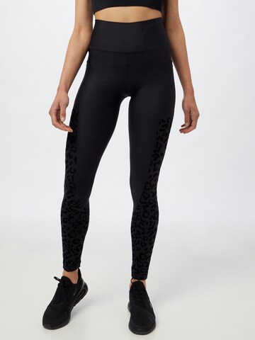 Skinny Pantaloni sport de la Athlecia pe negru: față