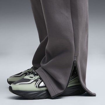 Loosefit Pantalon de sport PUMA en gris