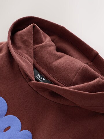 Sweat Next en rouge