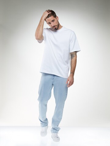 regular Jeans 'Taylor' di ABOUT YOU x Kevin Trapp in blu