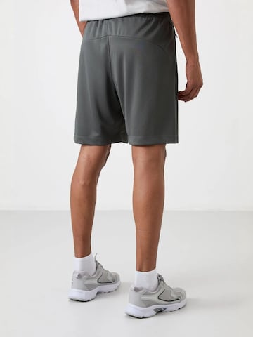 Regular Pantalon de sport Tommy Life en vert