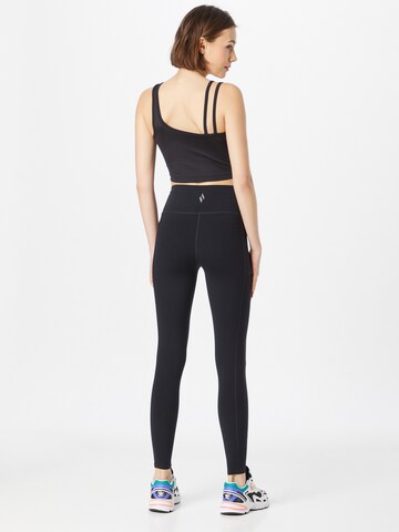 SKECHERS Skinny Sportbroek in Zwart