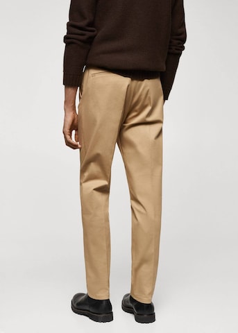 MANGO MAN Normalny krój Spodnie 'Dublino' w kolorze brązowy