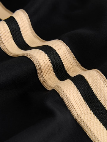 Next Szeroka nogawka Spodnie w kolorze czarny