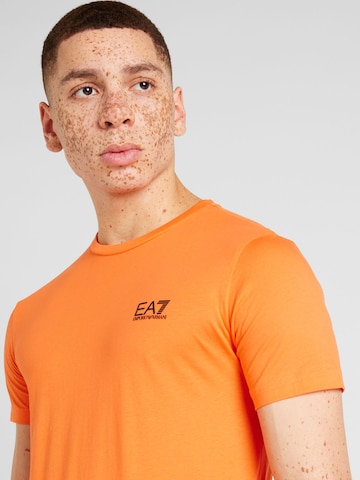 Tricou de la EA7 Emporio Armani pe portocaliu