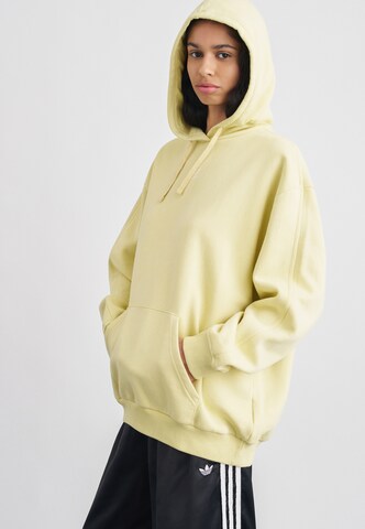 ADIDAS ORIGINALS Sweatshirt 'Ess' in Yellow: front